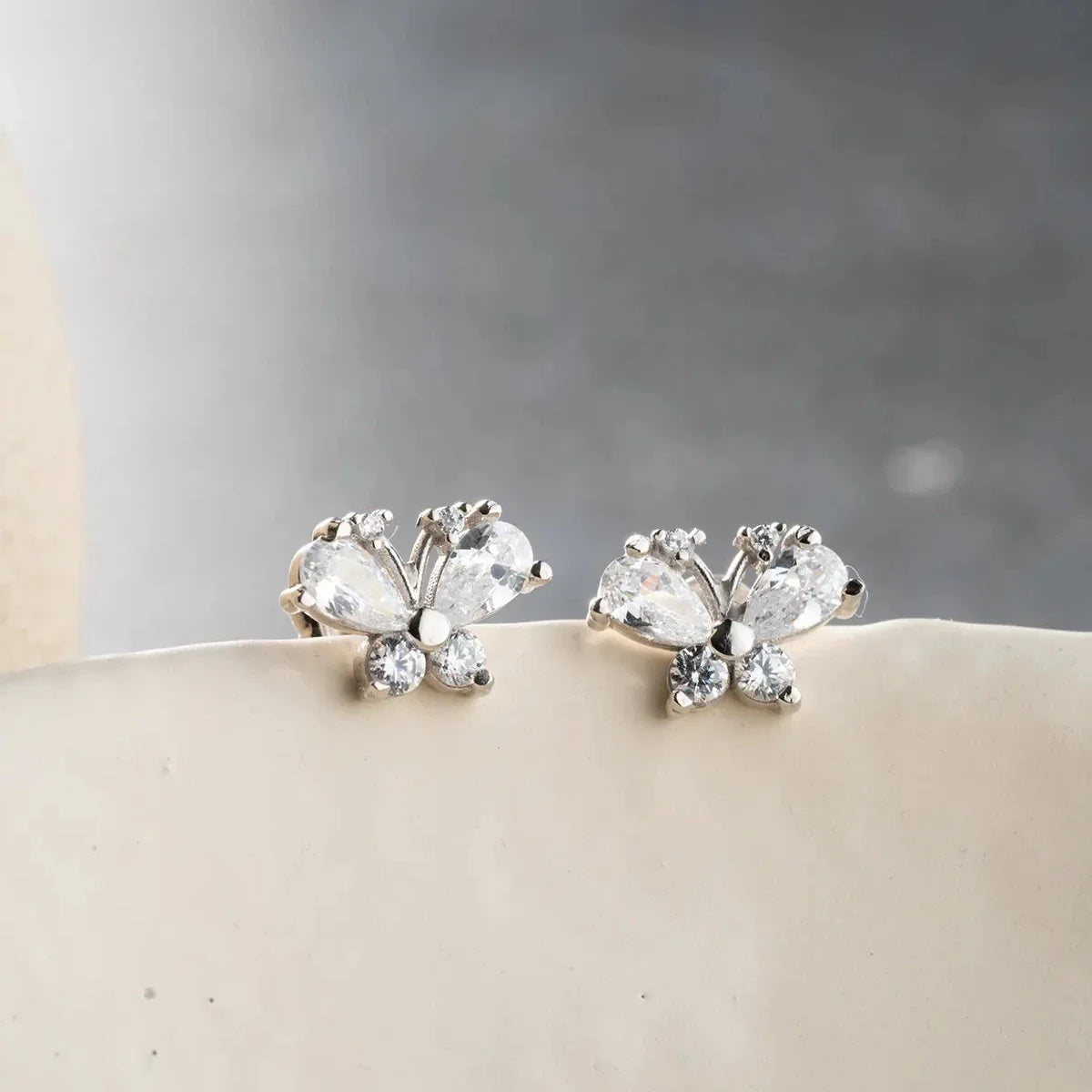 SCHMETTERLING BAGUETTE STEIN OHRRINGE | 925 SILBER