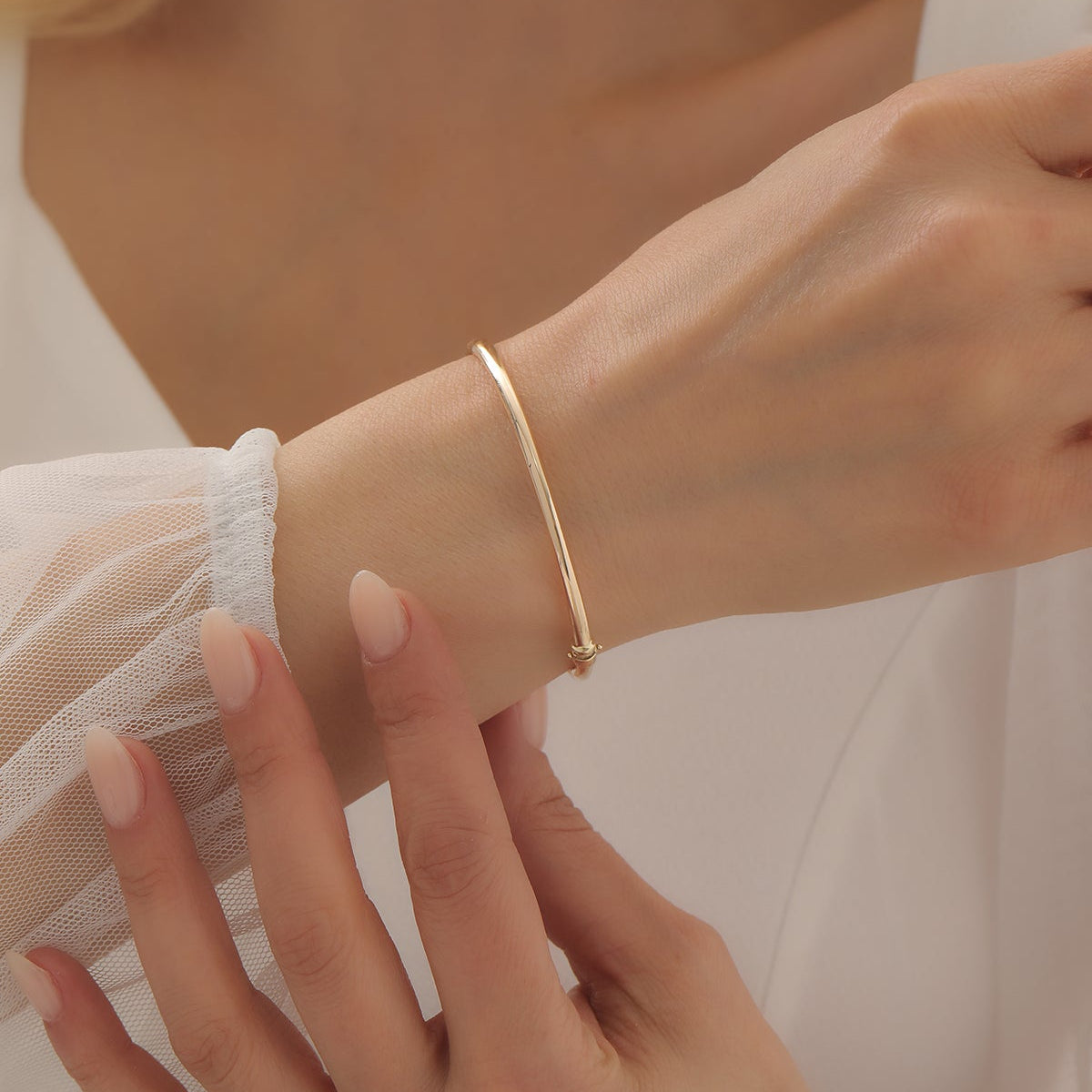 BOMBIERT HANDSCHELLENARMBAND | 14K GOLD