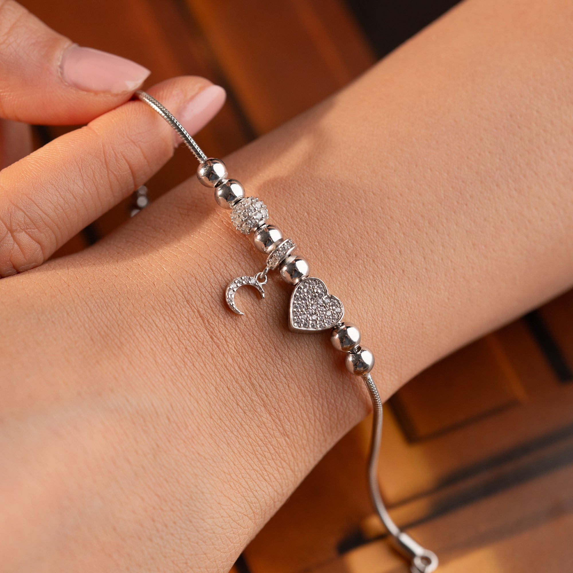SICHELMOND MIT HERZ-CHARM ARMKETTE | 925 SILBER