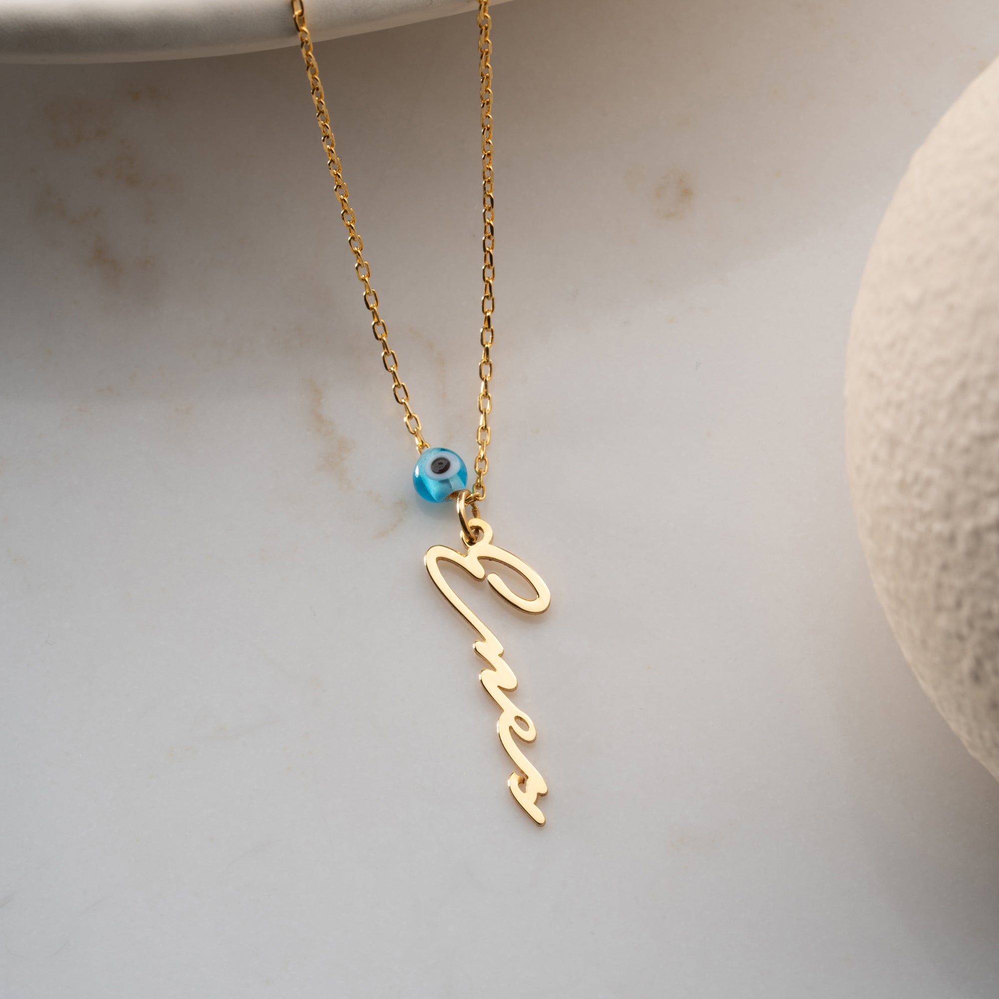 Vertical name chain with Nazar | Notera font | 925 silver