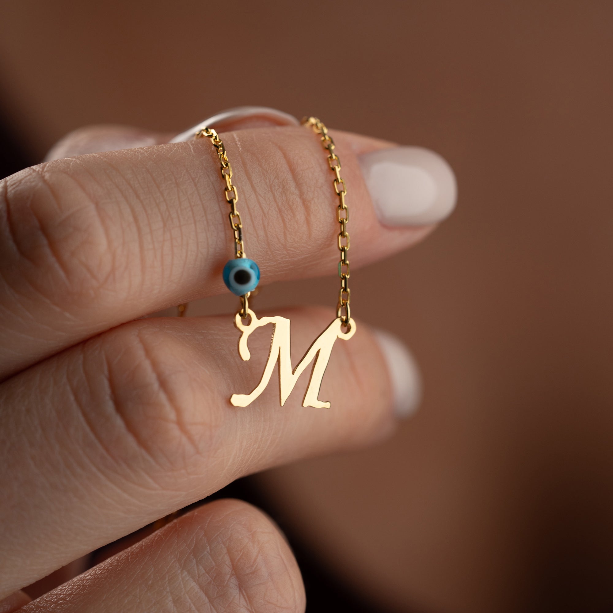 BUCHSTABENKETTE MIT BLAUE AUGE