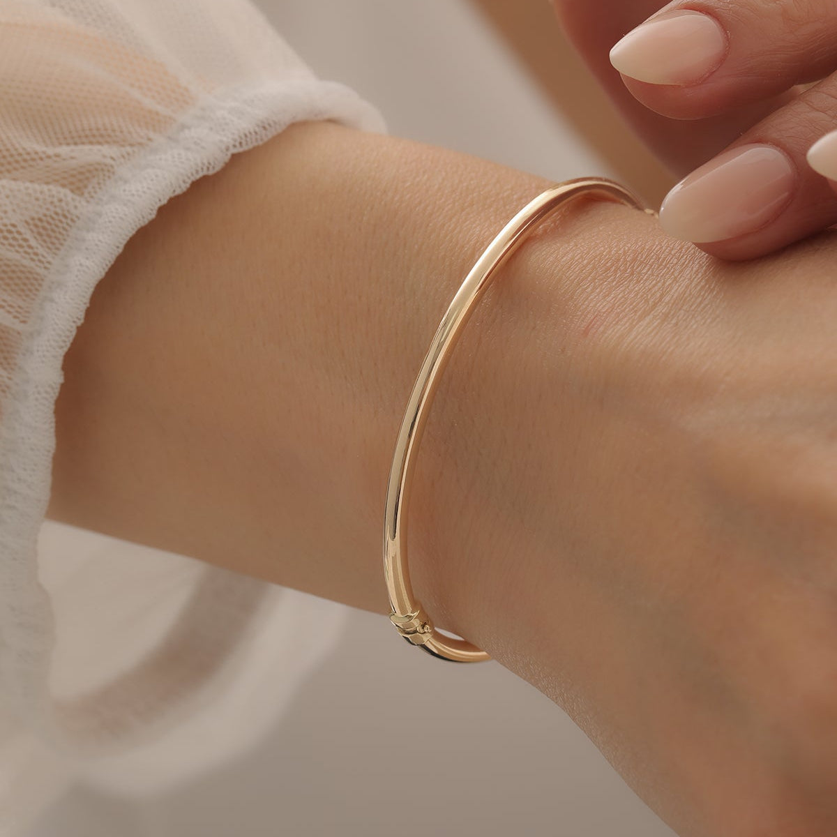 BOMBIERT HANDSCHELLENARMBAND | 14K GOLD
