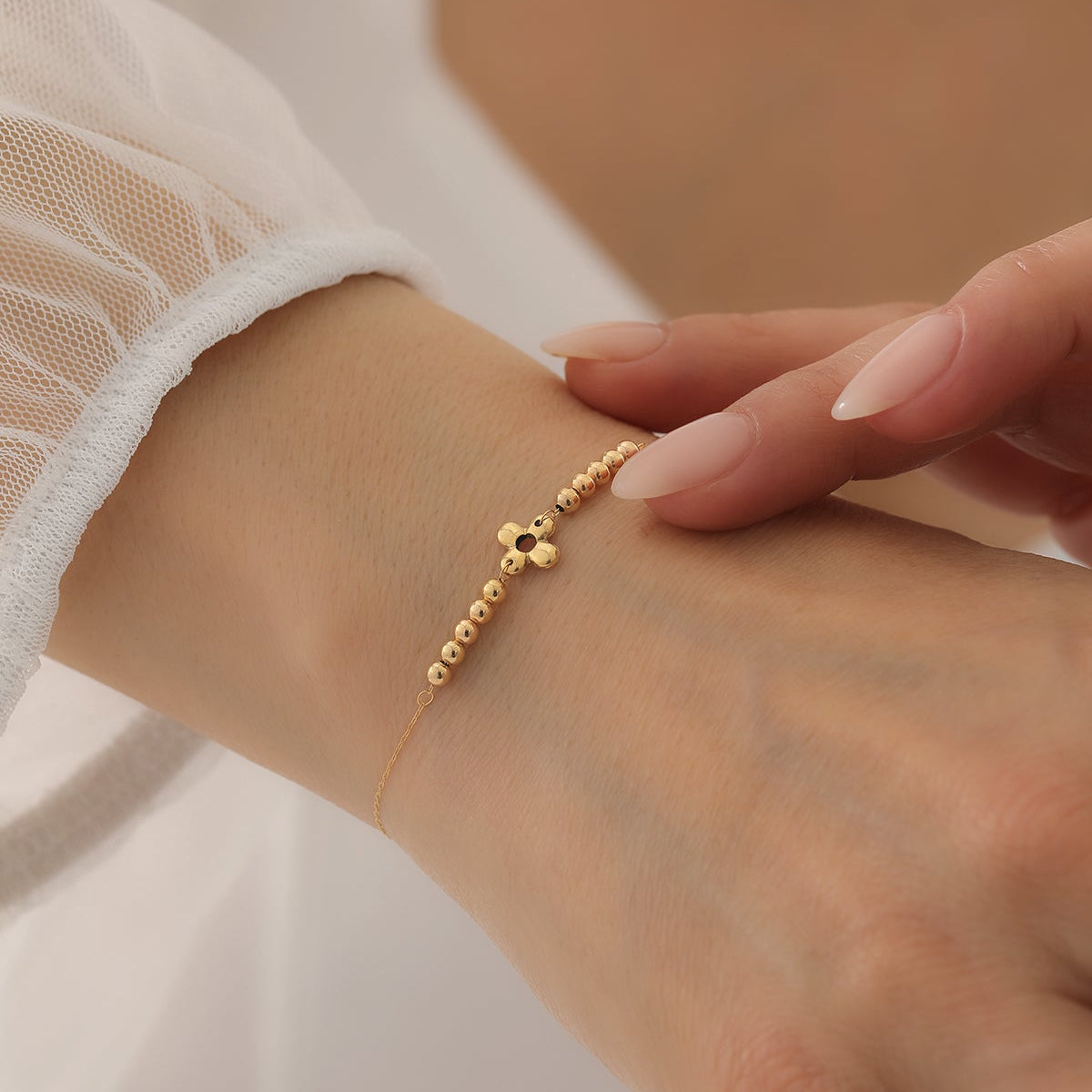 GLÄNZENDE REIHENKUGELN MIT KLEEBLATT-BLUMENMOTIV ARMKETTE | 14K GOLD