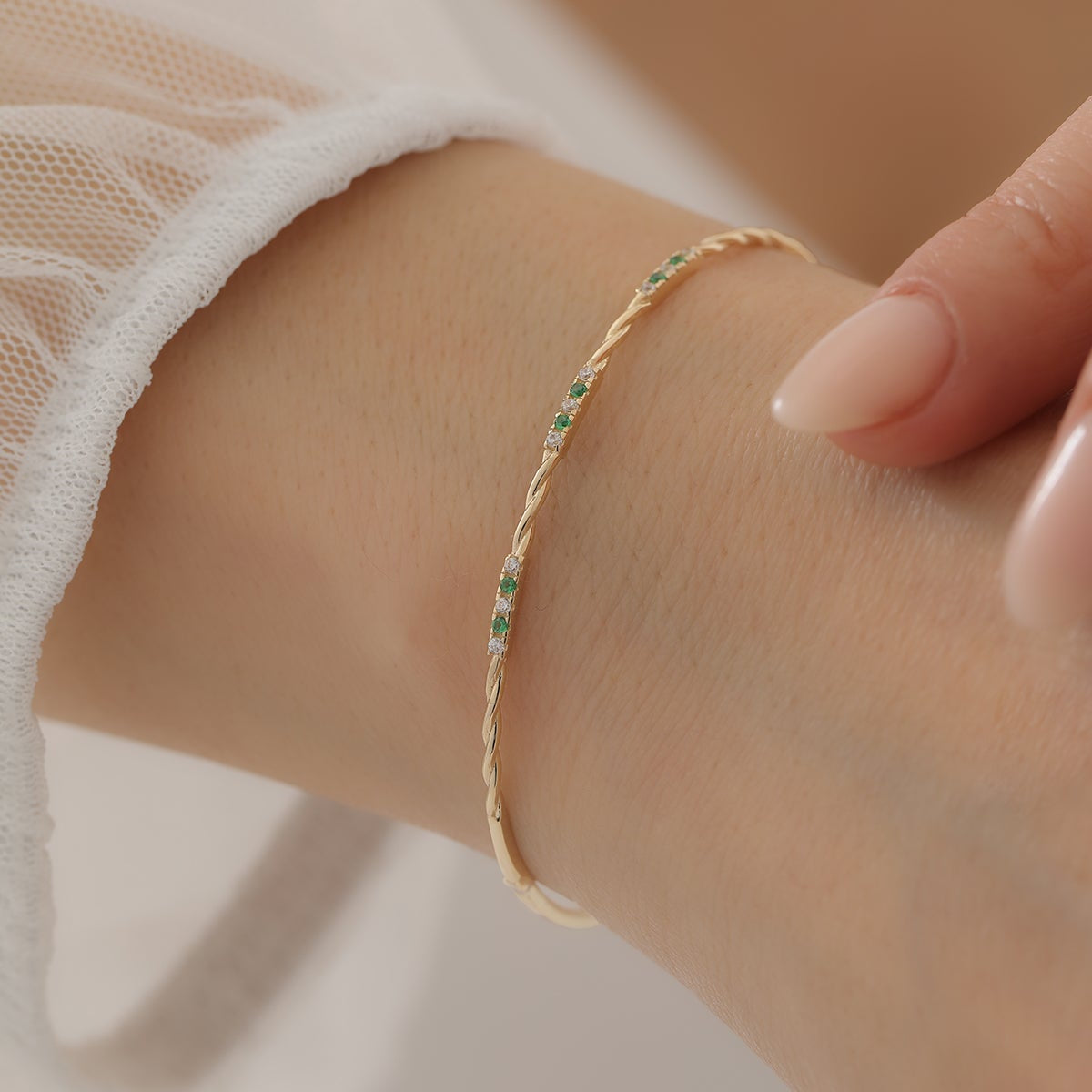 GEDREHTES HANDSCHELLENARMBAND | 14K GOLD