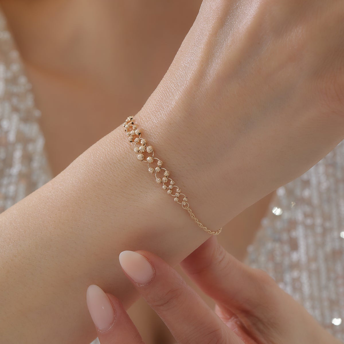 DORICA KUGEL-MIT SEILKETTEN- UND FLECHTDESIGN ARMKETTE | 14K GOLD