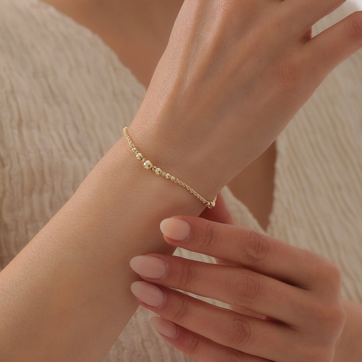 ARMBAND MIT DORIKA-KUGELN UND SEILKETTEN-DESIGN | 14K GOLD