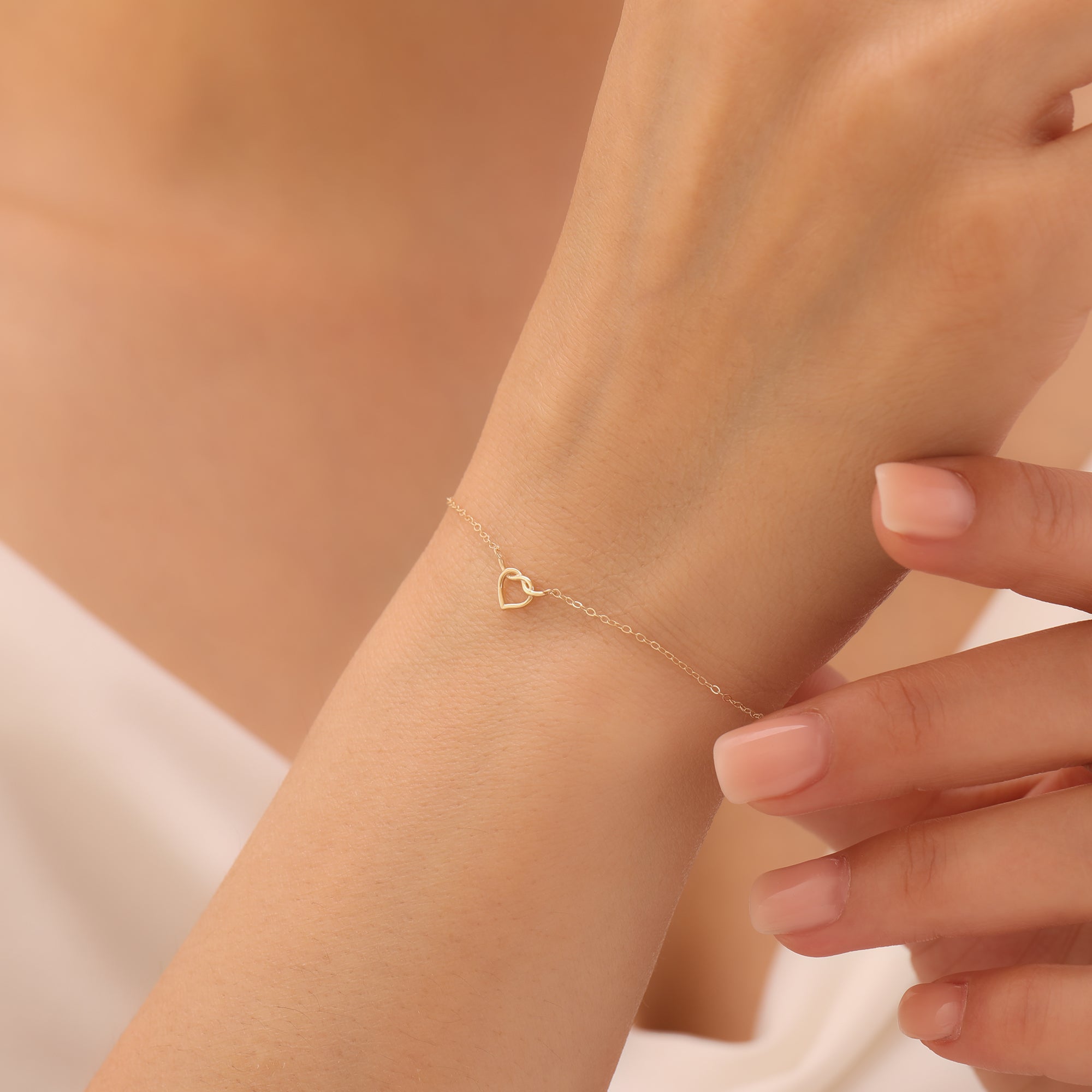 MINIMAL HERZ-KNOTEN ARMKETTE | 14K GOLD