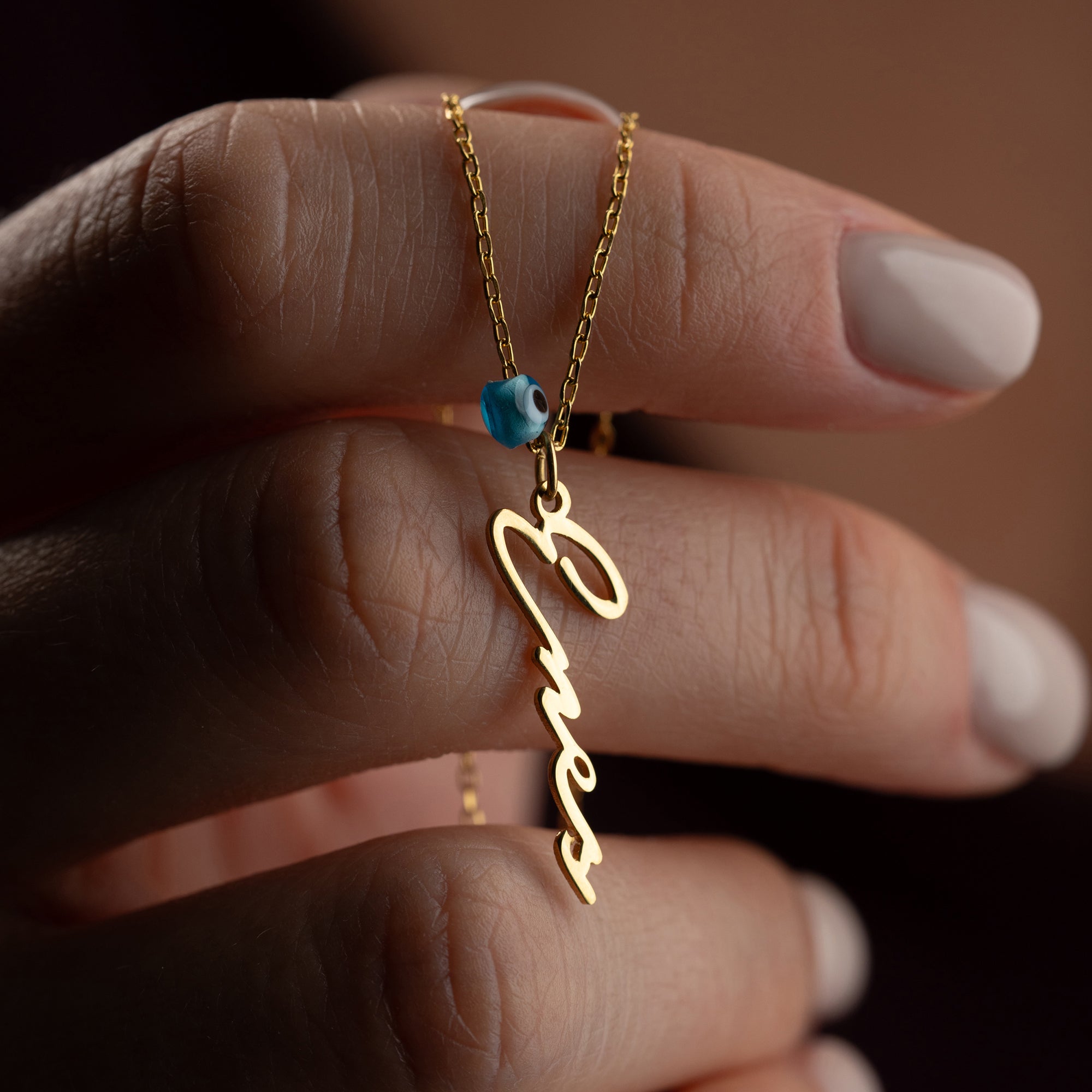 Vertical name chain with Nazar | Notera font | 925 silver