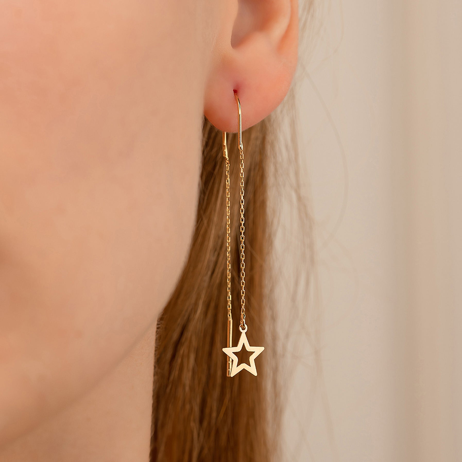 SCHWINGENDE STARS OHRRINGE | 14K GOLD